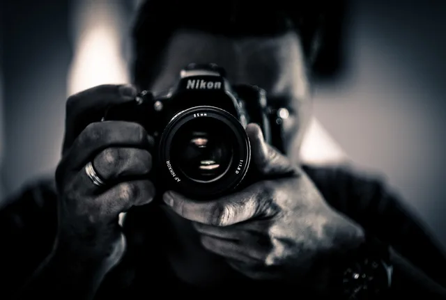 taking, picture, mirror, self-portrait, photo, camera, nikon, man, holding, hands, ring, black and white, mirror, camera, nikon, nikon, nikon, nikon, nikon. UGC Creator Business Operations: Seattle vs. Atlanta Rates