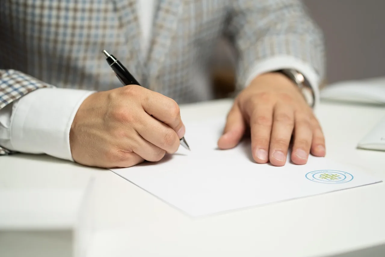 man, sign, paper, write, document, contract, signing, agreement, signature, signing document, signing contract, signing paper, sign, contract, contract, contract, contract, contract, signing, agreement, signature, signature. UGC Creator LLC Costs by State: Two Examples
