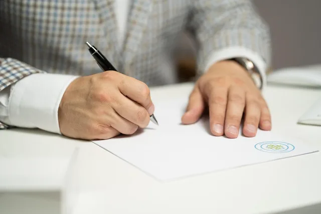 man, sign, paper, write, document, contract, signing, agreement, signature, signing document, signing contract, signing paper, sign, contract, contract, contract, contract, contract, signing, agreement, signature, signature. UGC Creator LLC Costs by State: Two Examples